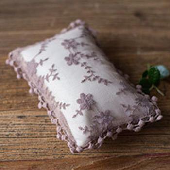 Coussin poseur pour nouveau-nés