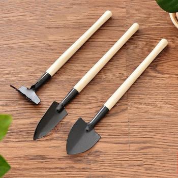 Set de jardinage compact avec pelle, râteau et bêche