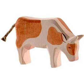 Kuh beim Fressen in Braun