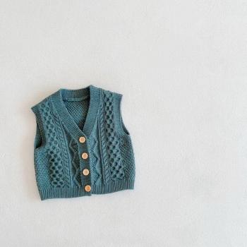 Chaleco de lana beige y azul para niñas