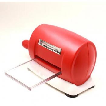 Outil de découpe pour scrapbooking