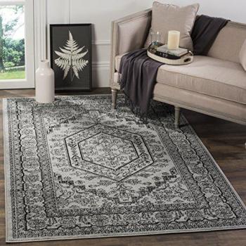 Cyan Floral Framed Area Rug