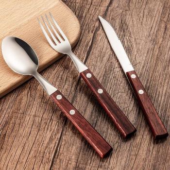 Houtgegrepen RVS bestekset: lepel, mes, vork en extra lepel voor dessert