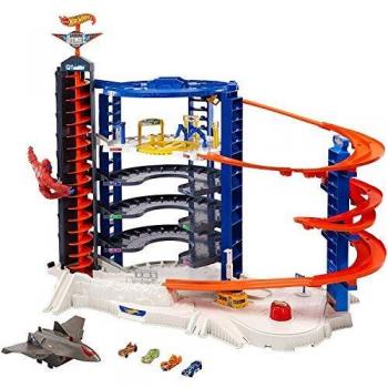 Garage Super Ultimate Hot Wheels con 4 veicoli inclusi, pista giocattolo per bambini 4+ anni, modello FML03