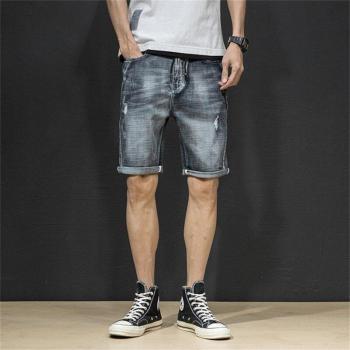 Pantalones cortos vaqueros con detalles rasgados