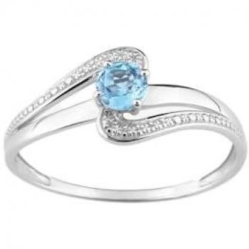 Bague femme ornée de topaze, or 18 carats