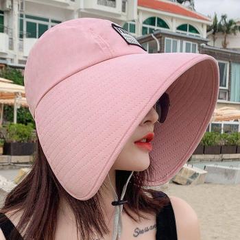 Sombrero de playa con ala grande y protección solar