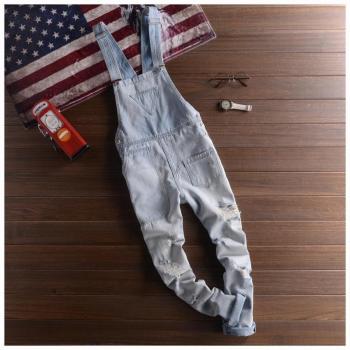 Pantalon salopette déchiré avec bretelles