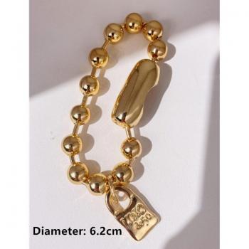Pulsera Retro con Ojos de Resina y Metal Dorado