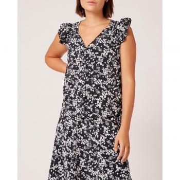 Camisa mujer cuello pico estampada en blanco y negro