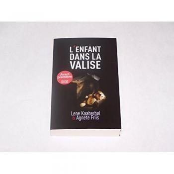 L'enfant dans la valise
