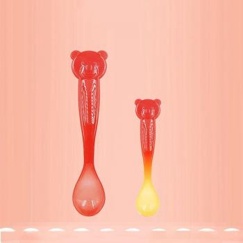 Cuchara plástica para bebés que cambia de color