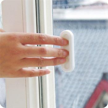 Poignée adhésive multifonction pour fenêtres et portes en verre