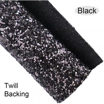 Cuir pailleté noir unif. 30×134 cm – rouleau muni de support élastique en sergé pour boucles d’oreille