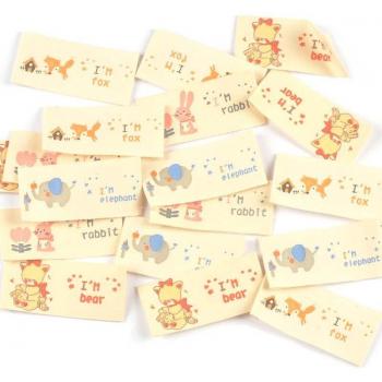 Accesorio DIY Mono: Etiqueta de Tela 50 Uds
