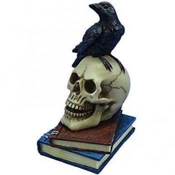 Ornate Raven Figurine on Books and Skull
