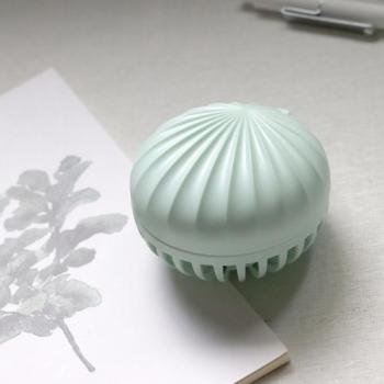 Ventilateur USB compact à silhouette de coquillage et miroir intégré