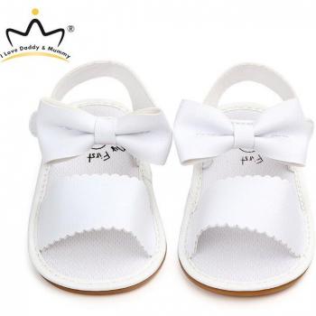 Sandalias antideslizantes de cuero para bebés, diseño lindo con lazo
