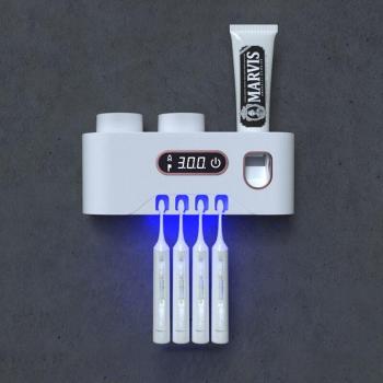 Dispensador automático de pasta de dientes y soporte UV