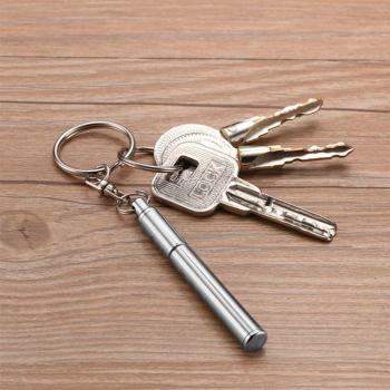 Porte-clé avec stylo télescopique et outil en acier inoxydable