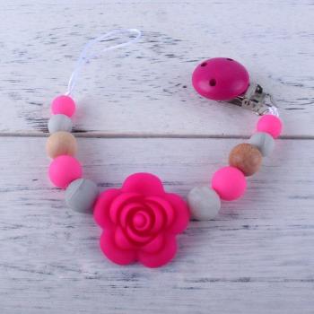Chupete de madera con flor y clips de silicona