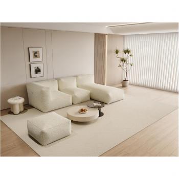Canapé en tissu bouclette beige avec pouf NOUMARA