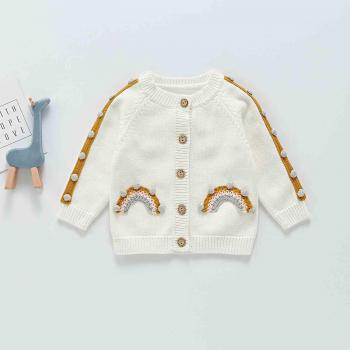 Cardigan pour bébé avec boutons en tricot