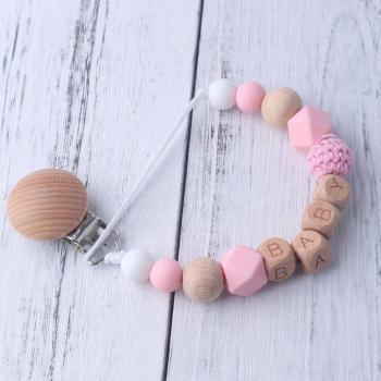 Clip para chupete con cadena de madera