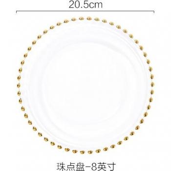 Plato de cena decorativo con acabado dorado y cuentas de vidrio