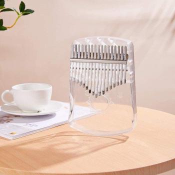 Piano de dedo pulgar de cristal