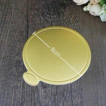 Bord der Backwerkzeuge – Gold‑Mousse Papierkuchenhalter