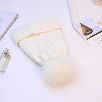 Bonnet doublé polaire avec pompon en fausse fourrure
