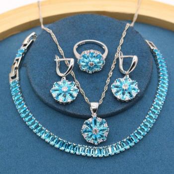 Bracelet, boucles d'oreilles, collier, bague en argent bleu ciel