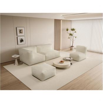 Sofá Noumara modular con puf y sillón de tela rizada beige