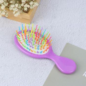 Peigne masseur de tête en plastique