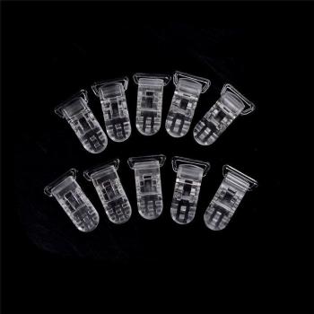 Attache-sucette en plastique transparent