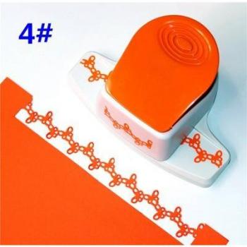 Machine à gaufrer avec coupeur de papier