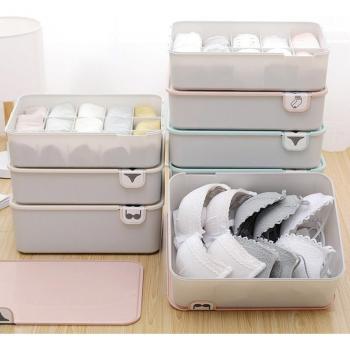 Boîte à compartiments réglables pour soutiens‑gorge et articles de bain