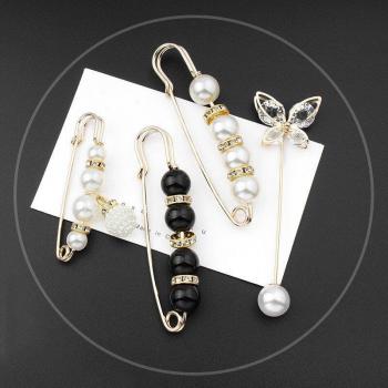 Accesorio de Moda: Gemelos Antideslumbrantes + Broche Falda
