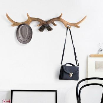 Accesorio de hogar con forma de cornamenta en resina