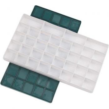Caja de pigmentos con compartimentos