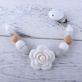 Porte-mamelon en silicone avec perles roses