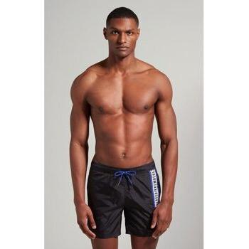 Pantaloncini da bagno Bikkembergs BKK3MBM03 in blu Clematis con logo laterale a strisce