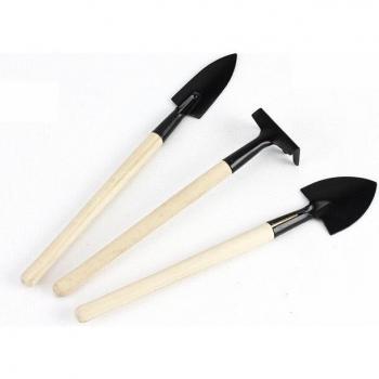 Mini herramienta de jardinería con mango de madera