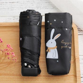 Mini paraguas de mujer con revestimiento negro y diseño animal