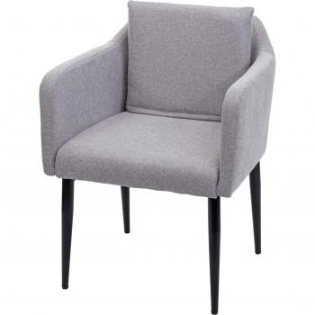 Salon lounge : fauteuil gris synthétique, pieds métalliques noirs, usage salle à manger/bureau