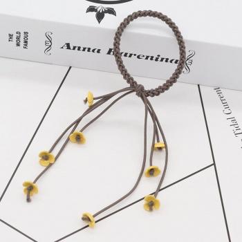 Élastique cheveux à motifs fleuris