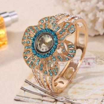 Reloj de mujer dorado con forma de flor y cristal